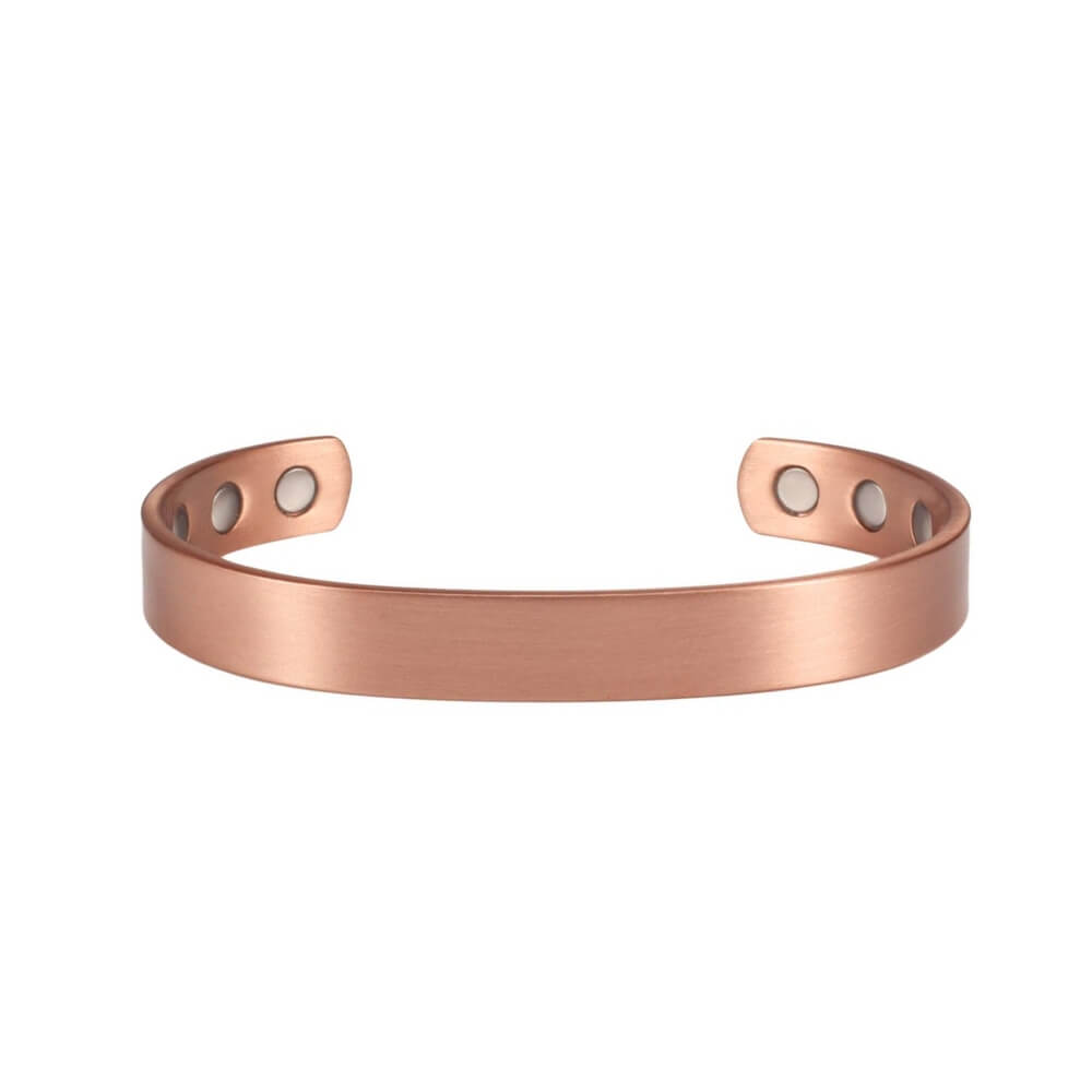 Photo sur fond blanc d'un jonc magnétique en cuivre de couleur bronze pour femme.
