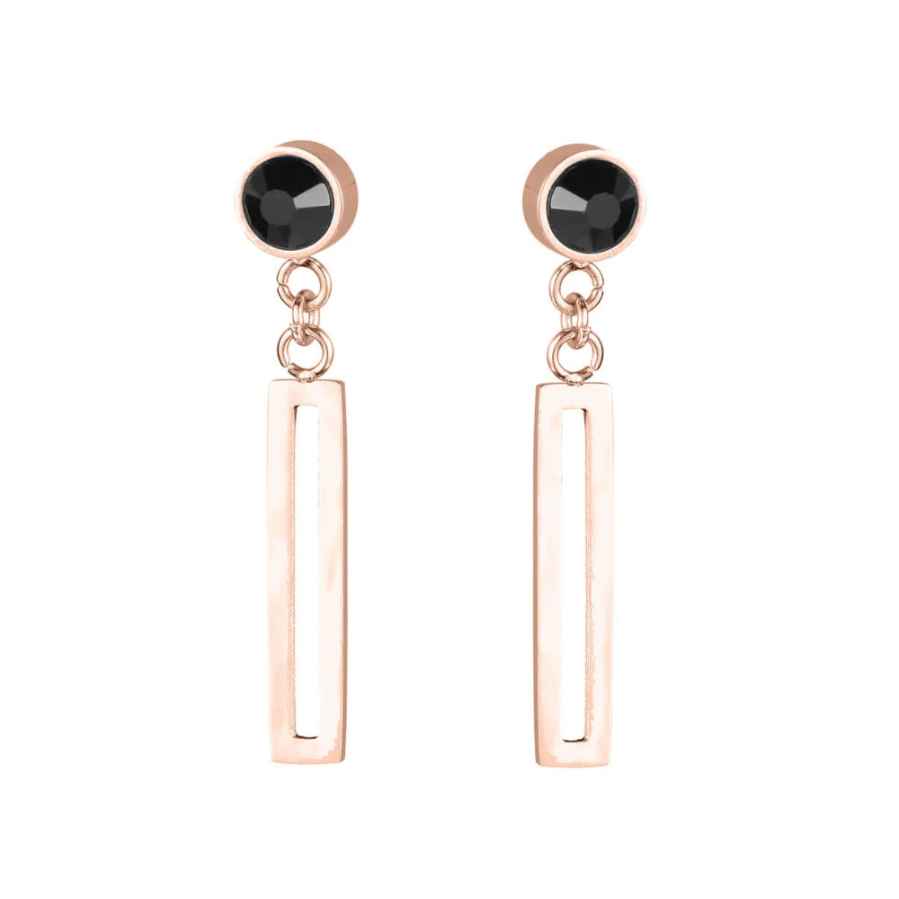 Photo sur fond blanc de boucles d'oreilles suspendues en aimant néodyme de couleur bronze.