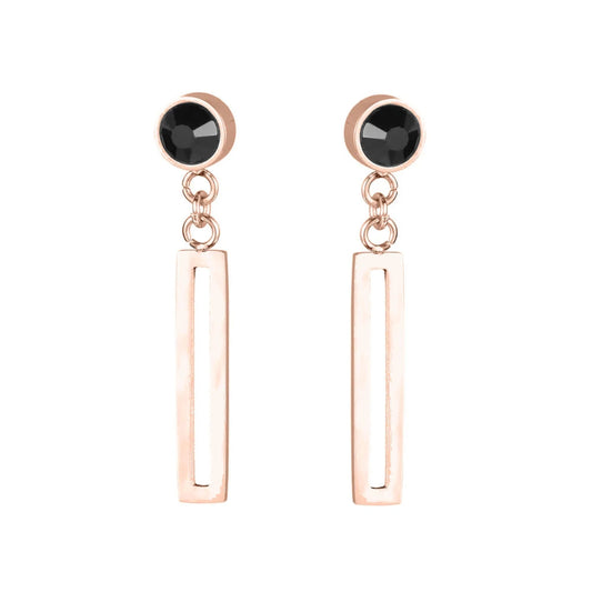 Photo sur fond blanc de boucles d'oreilles suspendues en aimant néodyme de couleur bronze.
