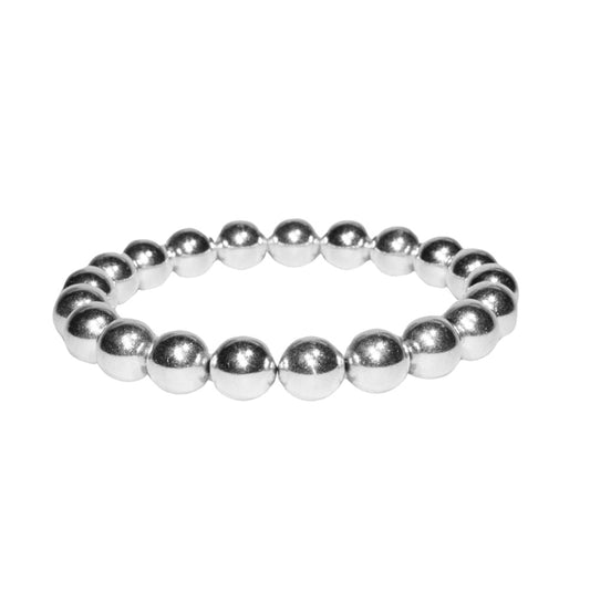 Photo sur fond blanc du bracelet en pierre d'aimant naturelle composé de perles argentées.