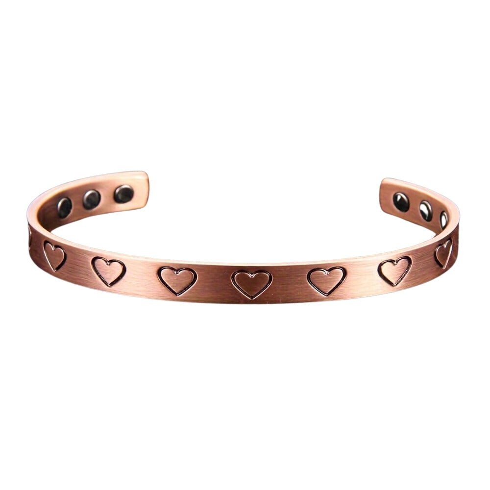 Photo sur fond blanc d'un jonc magnétique love en cuivre de couleur bronze pour femme.